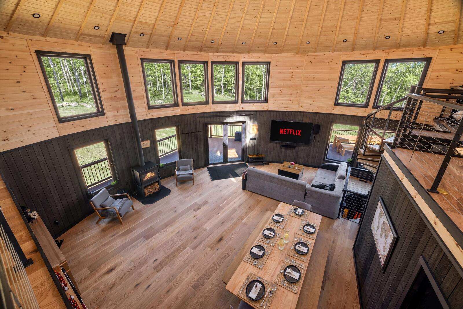 The round floor plan seen from the loft, kitchen, dining and lounge under one roof